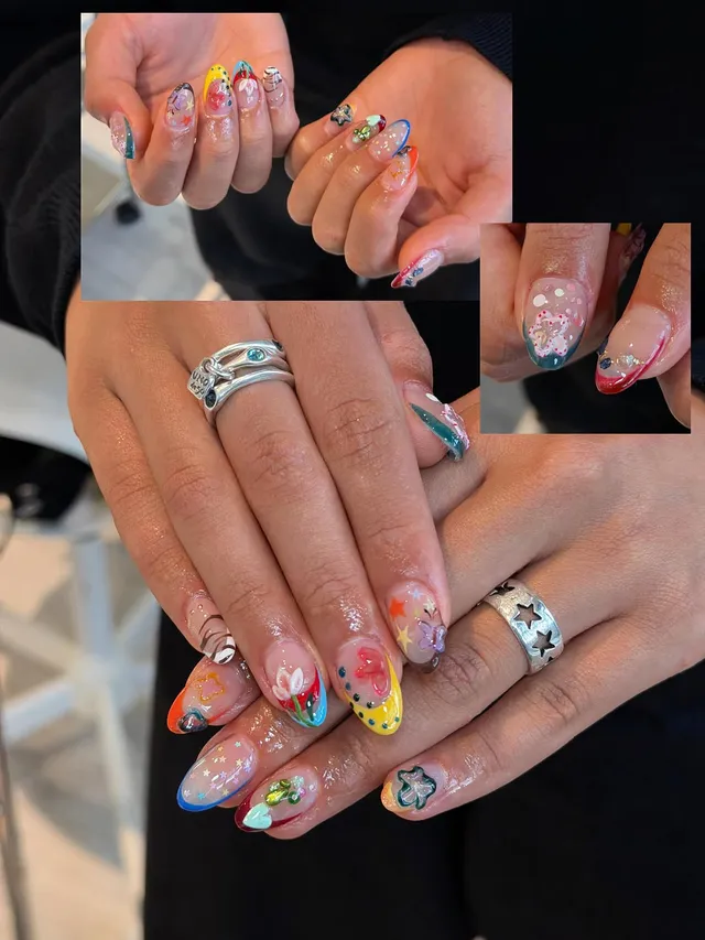 Bright freestyle rainbow nail art with charms